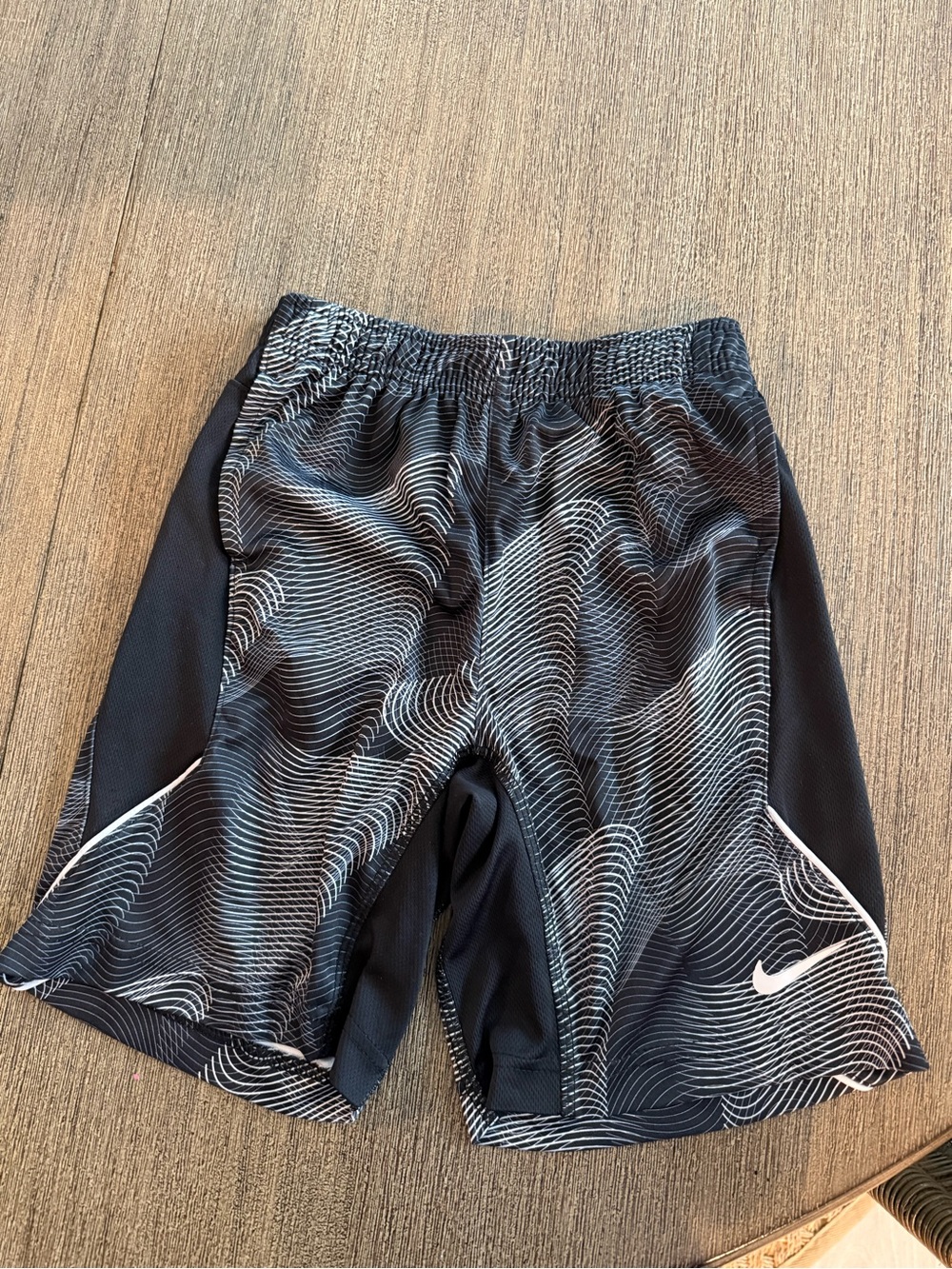 Nike Men’s Black Athletic Shorts with White Wave Design